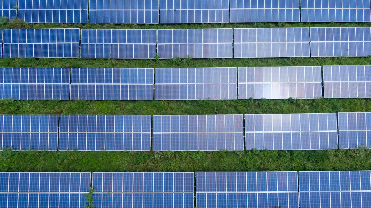 home-hero Aerial shot of a solar panel array generating renewable energy in Trenton, Georgia.